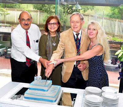 Pictured left to right cutting a cake are Prof. Charles Feldman (co-chair), Prof. Ames Dhai (co-chair), Prof. Peter Cleaton-Jones (chair) and Prof. Angela Woodiwiss (co-chair)